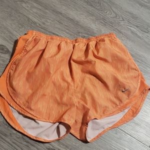 Orange nike shorts